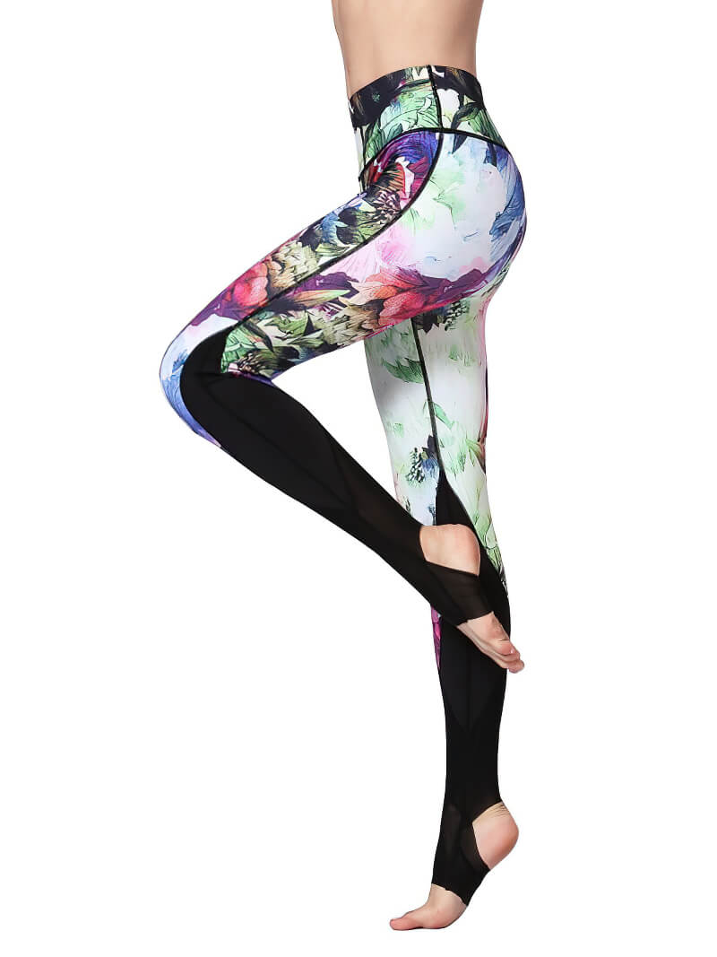 Women's floral printed yoga leggings with open heels in a balanced pose, showcasing vibrant colors and comfortable fit. SF1184